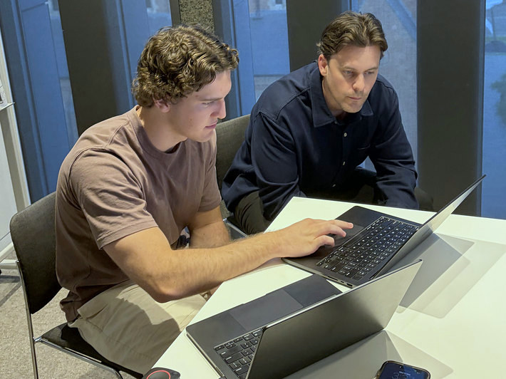Echelon sitting with a client at their laptop, mapping where the hours go